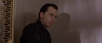 Movie still from “Little Odessa” (1994), directed by James Gray – A person wearing a black jacket; Close Up shot, Low angle