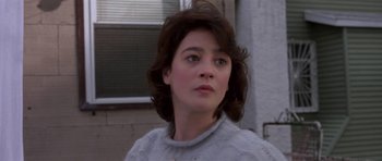 Movie still from “Little Odessa” (1994), directed by James Gray – A person with short hair; Close Up shot, Over the shoulder angle