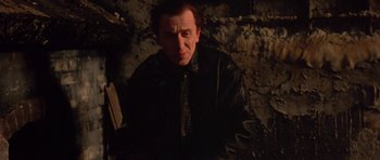 Movie still from “Little Odessa” (1994), directed by James Gray – A man wearing a leather jacket in the dark; Close Up shot, Low angle