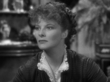 Movie still from “Little Women” (1933), directed by George Cukor – An old photo of an older woman in a black dress; Close Up shot, High angle