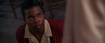 Movie still from “Lone Star” (1996), directed by John Sayles – A person wearing a shirt and tie; Close Up shot, Over the shoulder angle