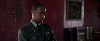 Movie still from “Lone Star” (1996), directed by John Sayles – A person wearing a military uniform; Medium shot, Over the shoulder angle