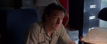 Movie still from “Lone Star” (1996), directed by John Sayles – A person wearing a uniform; Close Up shot, Low angle