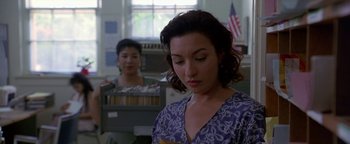 Movie still from “Lone Star” (1996), directed by John Sayles – Two women are standing in an office room; Close Up shot, Low angle