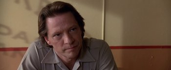 Movie still from “Lone Star” (1996), directed by John Sayles – A person wearing a shirt; Close Up shot, Low angle