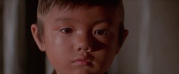 Movie still from “Lone Wolf and Cub: Baby Cart to Hades” (1972), directed by Kenji Misumi – A young boy's face; Extreme Close Up shot, High angle