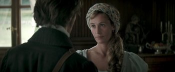 Movie still from “Lost Illusions” (2021), directed by Xavier Giannoli – A man and a woman are looking at one another; Close Up shot, Over the shoulder angle