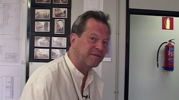 Movie still from “Lost in La Mancha” (2002), directed by Louis Pepe – A person wearing a white shirt; Close Up shot, Low angle
