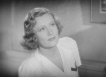 Movie still from “Love Affair” (1939), directed by Leo McCarey – An old black and white photo of a woman; Close Up shot, High angle