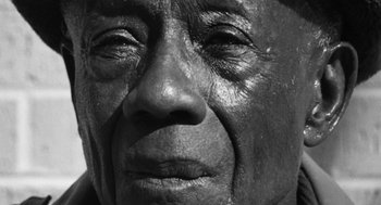 An old man with a very wrinkled face