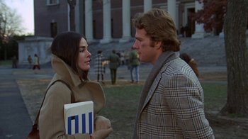 Movie still from “Love Story” (1970), directed by Arthur Hiller – A man and a woman talking to each other outside; Medium shot, Over the shoulder angle