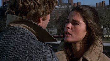 Movie still from “Love Story” (1970), directed by Arthur Hiller – A man and a woman talking to each other outside; Close Up shot, Over the shoulder angle