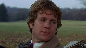 Movie still from “Love Story” (1970), directed by Arthur Hiller – A person wearing a jacket and tie; Close Up shot, Over the shoulder angle