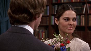 Movie still from “Love Story” (1970), directed by Arthur Hiller – A man and a woman are talking to each other; Close Up shot, Over the shoulder angle