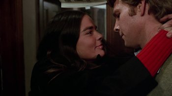 Movie still from “Love Story” (1970), directed by Arthur Hiller – A man and a woman looking into each others eyes; Close Up shot, Over the shoulder angle