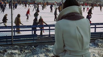 Movie still from “Love Story” (1970), directed by Arthur Hiller – A group of people skating on a rink; Extreme Wide shot, High angle