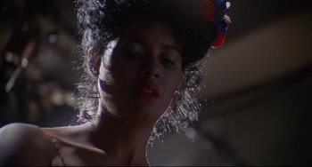 Movie still from “Love Streams” (1984), directed by John Cassavetes – A person wearing a hat; Close Up shot, Low angle