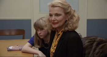 Movie still from “Love Streams” (1984), directed by John Cassavetes – A woman and a young girl are posing for a picture; Close Up shot, Over the shoulder angle