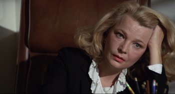 Movie still from “Love Streams” (1984), directed by John Cassavetes – A woman with blonde hair wearing a black jacket; Close Up shot, Over the shoulder angle