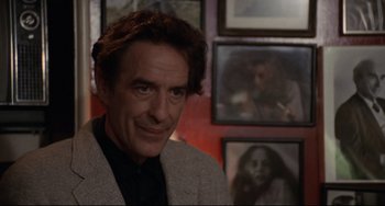 Movie still from “Love Streams” (1984), directed by John Cassavetes – A person in a room; Close Up shot, Over the shoulder angle