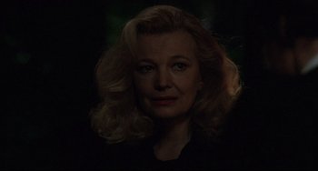 Movie still from “Love Streams” (1984), directed by John Cassavetes – A person with blonde hair; Close Up shot, Over the shoulder angle