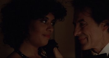 Movie still from “Love Streams” (1984), directed by John Cassavetes – A man and a woman looking at one another; Close Up shot, Over the shoulder angle