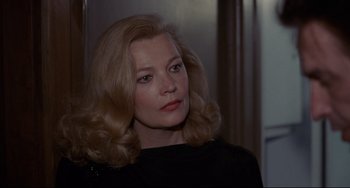 Movie still from “Love Streams” (1984), directed by John Cassavetes – A person with blonde hair; Close Up shot, Over the shoulder angle