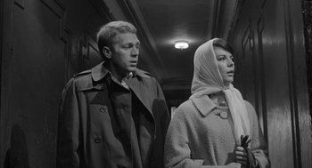 Movie still from “Love with the Proper Stranger” (1963), directed by Robert Mulligan – A man and a woman standing next to each other; Close Up shot, Low angle