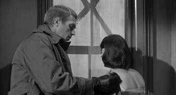 Movie still from “Love with the Proper Stranger” (1963), directed by Robert Mulligan – A black and white photo of a man and a woman; Close Up shot, Over the shoulder angle