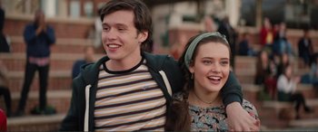 Movie still from “Love, Simon” (2018), directed by Greg Berlanti – A man and a woman smiling for the camera; Close Up shot, Low angle