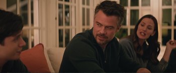 Movie still from “Love, Simon” (2018), directed by Greg Berlanti – A person sitting on a couch; Close Up shot, Over the shoulder angle