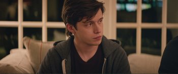 Movie still from “Love, Simon” (2018), directed by Greg Berlanti – A young man sitting in front of a window; Close Up shot, Over the shoulder angle