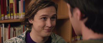 Movie still from “Love, Simon” (2018), directed by Greg Berlanti – A young man looking into a mirror while standing up; Close Up shot, Over the shoulder angle