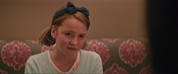 Movie still from “Love, Simon” (2018), directed by Greg Berlanti – A young girl with a bow in her hair; Close Up shot, Over the shoulder angle