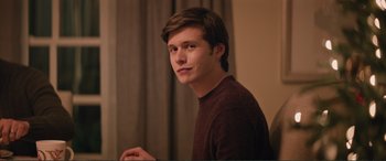 Movie still from “Love, Simon” (2018), directed by Greg Berlanti – A young man in a brown shirt is looking at the camera; Close Up shot, Over the shoulder angle