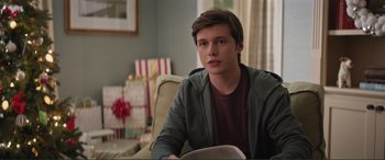 Movie still from “Love, Simon” (2018), directed by Greg Berlanti – A man sitting on a chair in a living room; Close Up shot, Over the shoulder angle