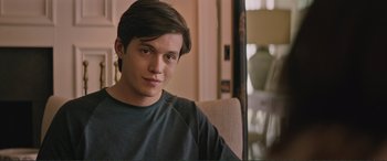 Movie still from “Love, Simon” (2018), directed by Greg Berlanti – A young man sitting in a chair in front of a mirror; Close Up shot, Over the shoulder angle