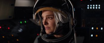 Movie still from “Lucy in the Sky” (2019), directed by Noah Hawley – A woman wearing a space suit and a helmet; Close Up shot, Low angle
