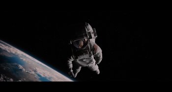 Movie still from “Lucy in the Sky” (2019), directed by Noah Hawley – An image of an astronaut in the space; Wide shot, Overhead angle