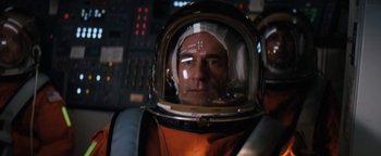 Movie still from “Lucy in the Sky” (2019), directed by Noah Hawley – A man in a space suit and a helmet; Close Up shot, Low angle