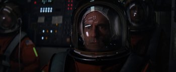 Movie still from “Lucy in the Sky” (2019), directed by Noah Hawley – A person wearing a space helmet; Close Up shot, Low angle