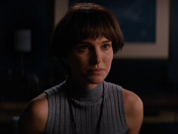 Movie still from “Lucy in the Sky” (2019), directed by Noah Hawley – A person with short hair wearing a sweater; Close Up shot, Over the shoulder angle