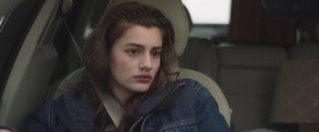 Movie still from “Ma” (2019), directed by Tate Taylor – A woman sitting in the back seat of a car; Close Up shot, Over the shoulder angle