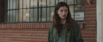 Movie still from “Ma” (2019), directed by Tate Taylor – A woman standing in front of a brick building; Close Up shot, Over the shoulder angle