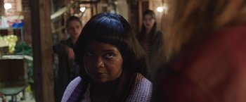 Movie still from “Ma” (2019), directed by Tate Taylor – A person wearing a sweater; Close Up shot, Over the shoulder angle