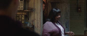 Movie still from “Ma” (2019), directed by Tate Taylor – A woman standing next to another woman in front of a door; Medium shot, Over the shoulder angle