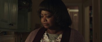 Movie still from “Ma” (2019), directed by Tate Taylor – A person wearing a sweater; Close Up shot, Over the shoulder angle