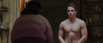 Movie still from “Ma” (2019), directed by Tate Taylor – A man standing in front of a woman in front of a mirror; Medium shot, Over the shoulder angle