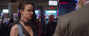 Movie still from “Ma” (2019), directed by Tate Taylor – A woman standing in front of a slot machine; Close Up shot, Over the shoulder angle