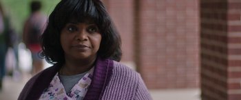 Movie still from “Ma” (2019), directed by Tate Taylor – A person wearing a sweater; Close Up shot, Over the shoulder angle